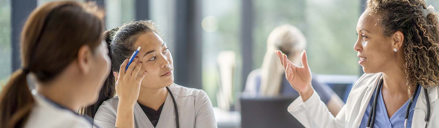 A group of medical professionals in a meeting